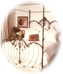 Antique Iron Beds by Cathouse