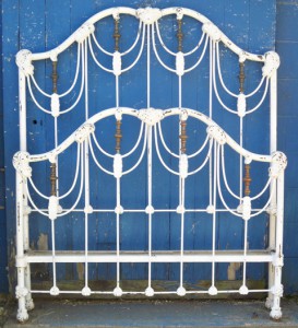 The Draped Iron Bed