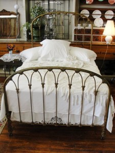 Antique Iron Beds With A Religious Motif