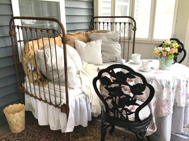 Crib-Used-As-Couch Antique Iron Beds