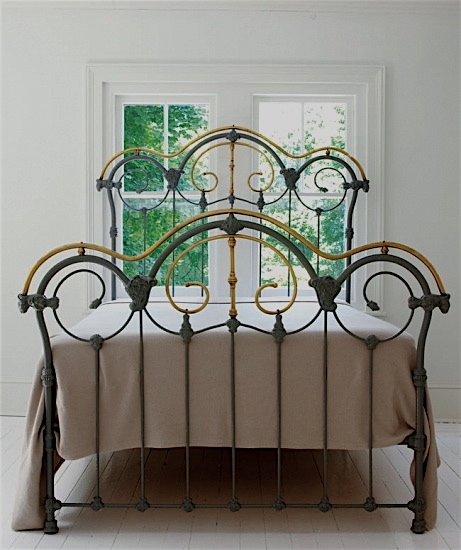 Antique Iron Beds . Placed in Front of Windows