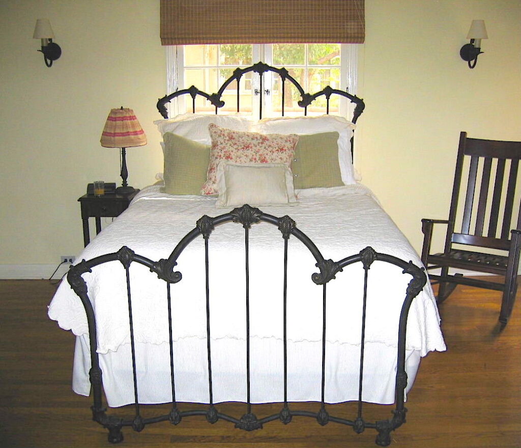 Antique Iron Beds . Placed in Front of Windows