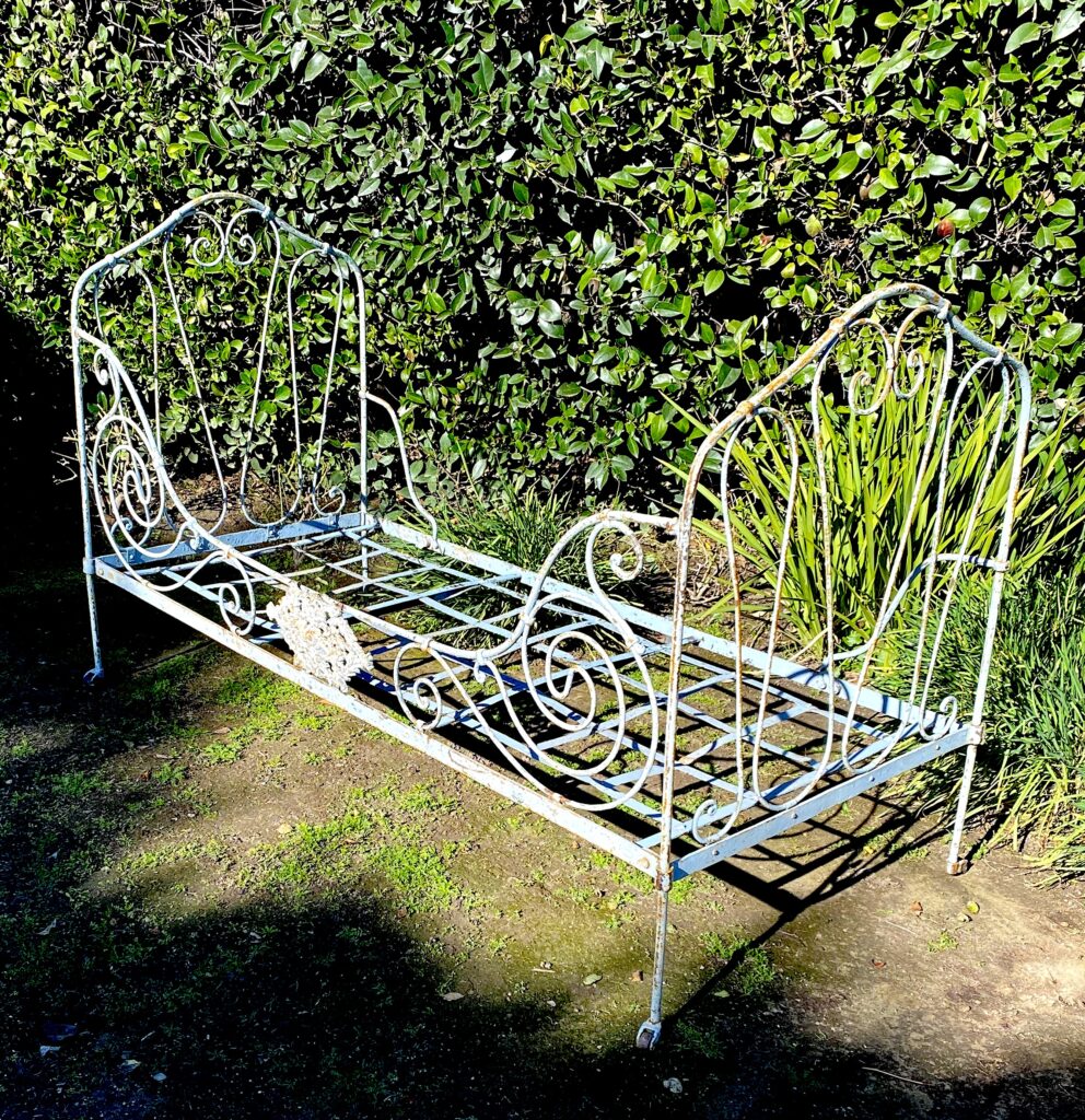 The Unyielding Legacy of Antique Iron Beds Cathouse