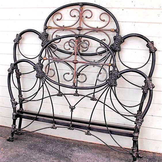 antique iron bed with Lots of Brass