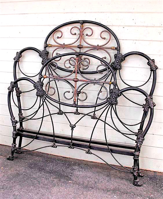antique iron bed with Lots of Brass